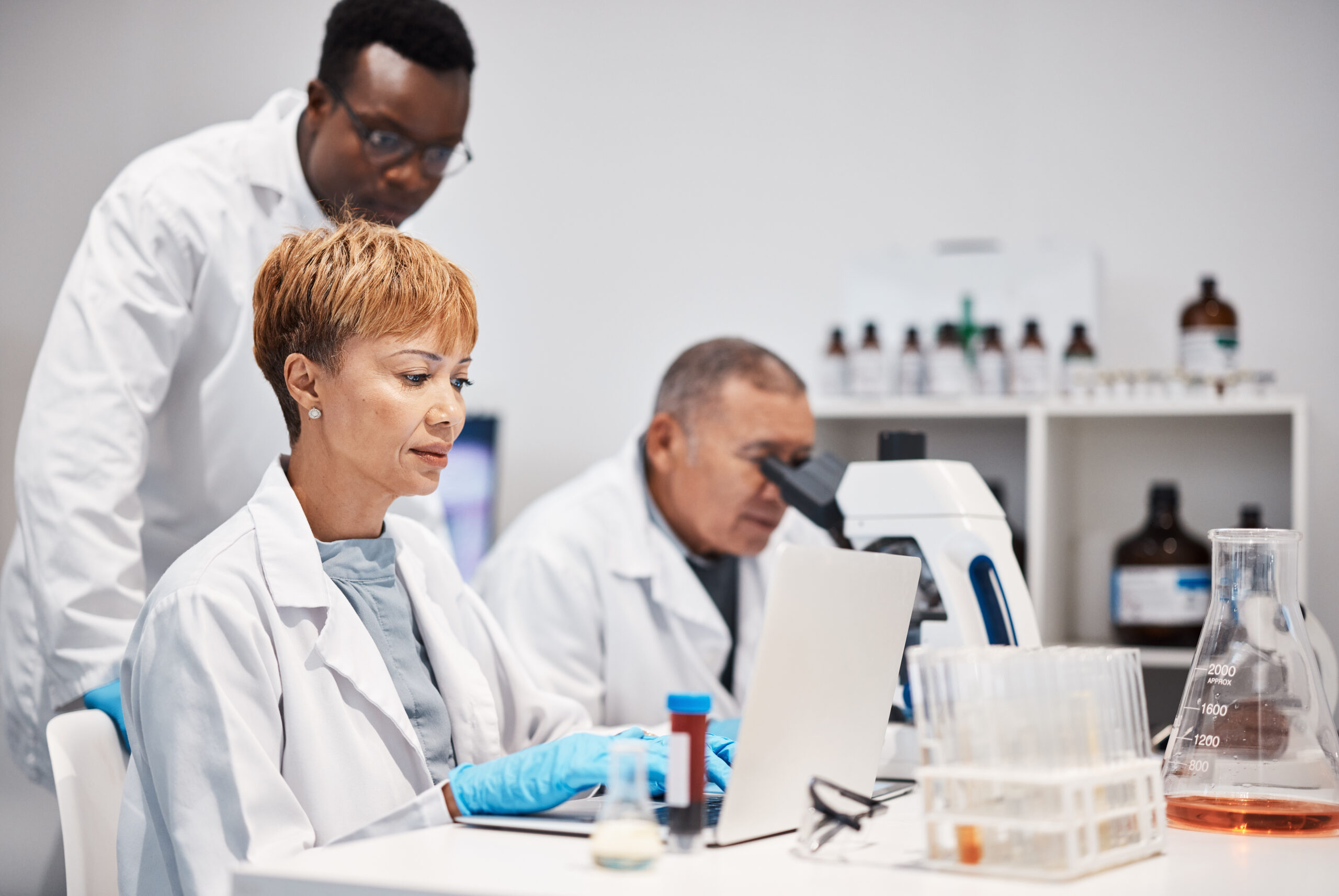 science-research-and-woman-with-laptop-in-laborat-2023-11-27-05-06-49-utc